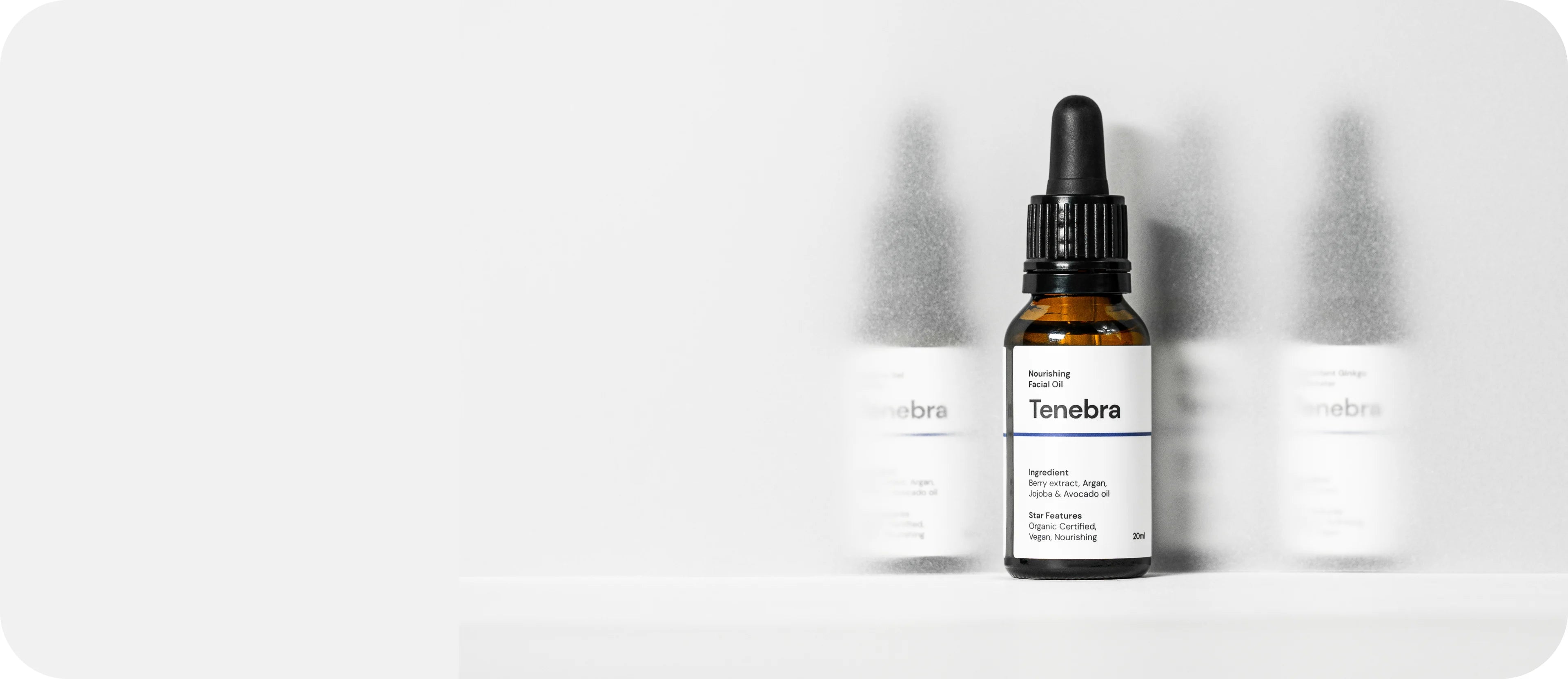 skincare bottle with dropper on a white background