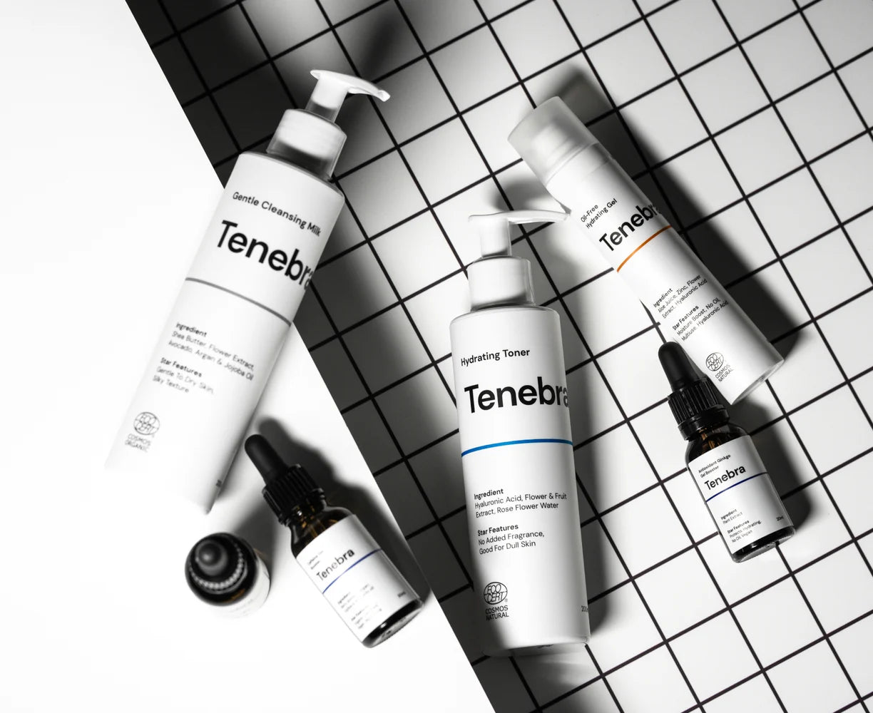 skincare products on a grid background