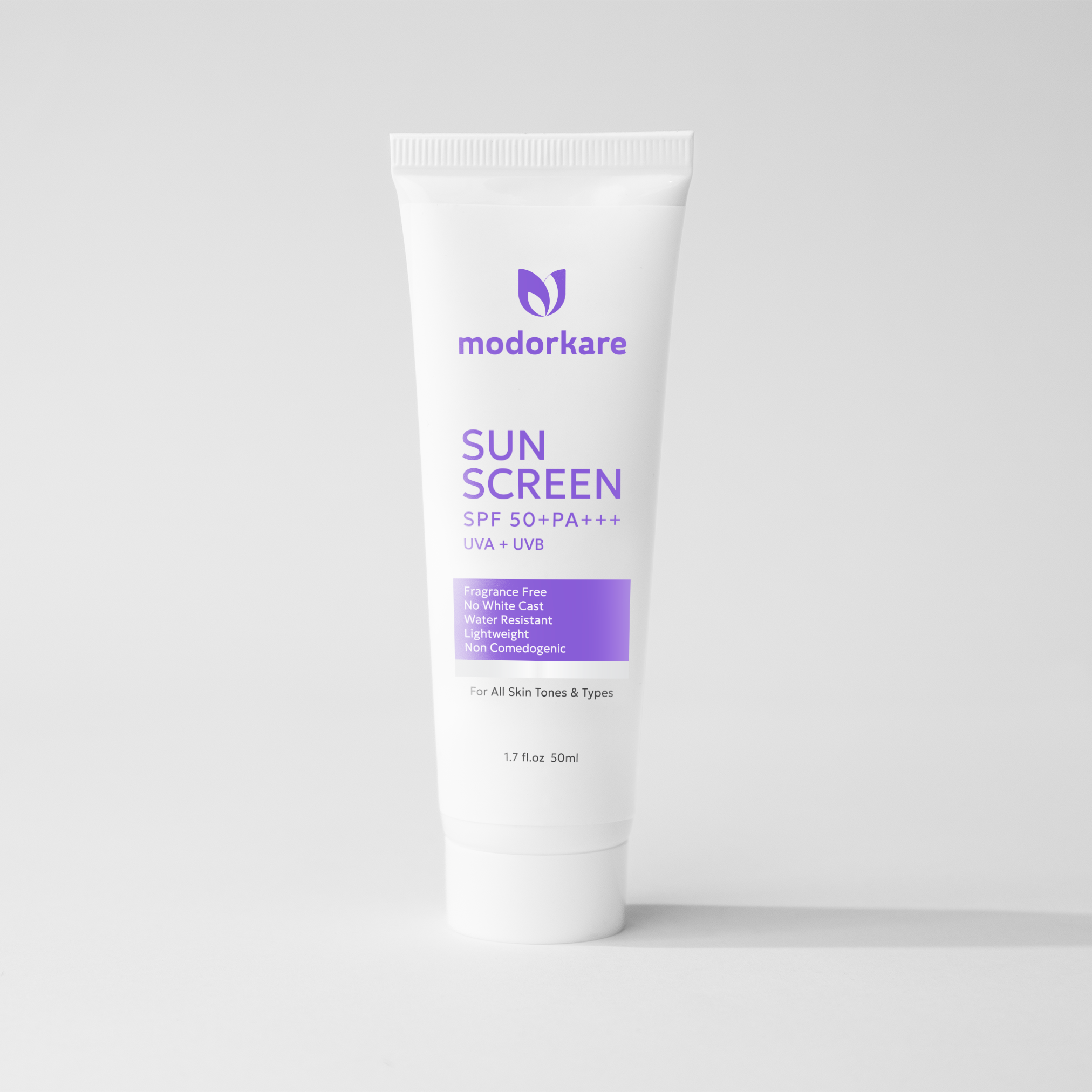 Sunscreen tube with 'modorkare' branding on a light gray background